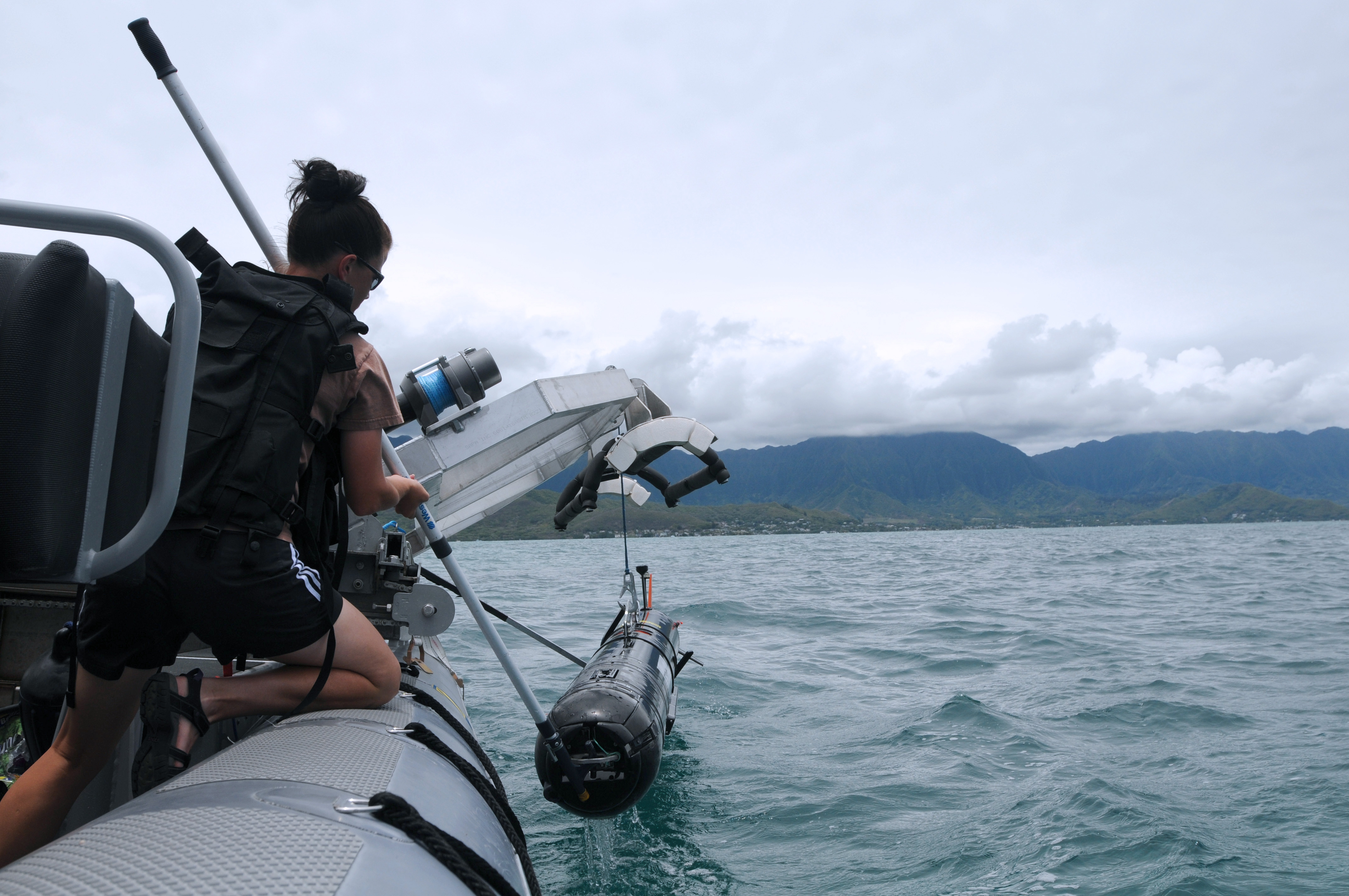This is an image of an underwater unmanned vehicle testing activity in Kanaohe Bay, Hawaii.